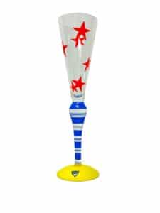 Orrefors Clown – champagneglas i kristall röda stjärnor gul fot – design Anne Nilsson – vintage