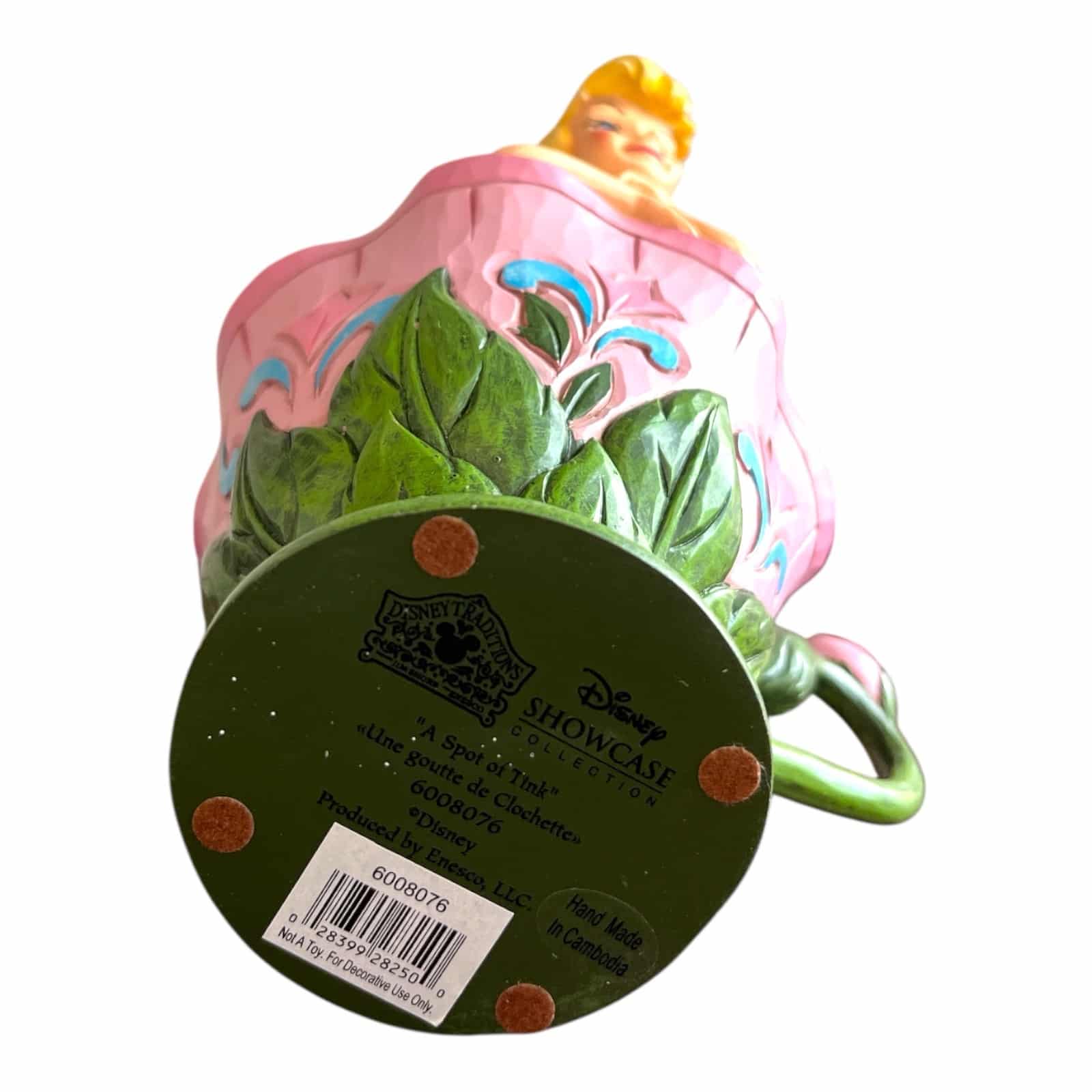Disney - Figurin - Peter Pan  Tingeling sitter i en blomma / A spot of think Design Jim Shore