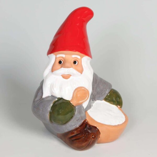 Rolf Berg Tomte sitter med Grötfat H 19 cm